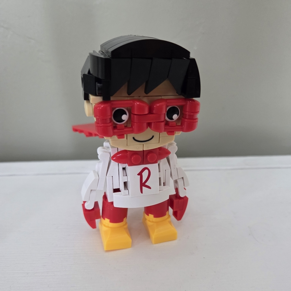 Ryan's World Build It Red TITAN  Building Block Toy with Red and Yellow Accents